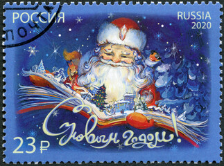 RUSSIA - 2020: shows Father frost and book, devoted Happy New Year, 2020