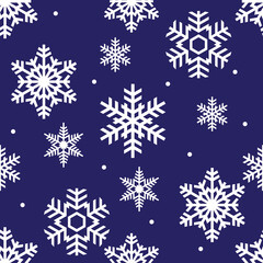 Seamless winter pattern of white openwork snowflakes on a blue background, vector illustration