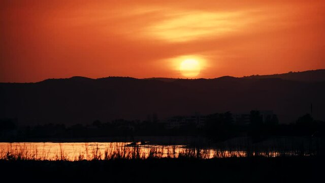 Red sunset over sea coastal landscape. Capi Corb, Mediterranean coast of Spain.