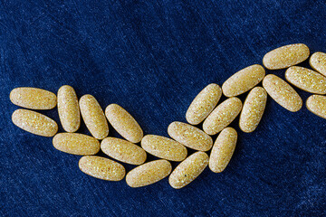 close-up of multivitamin and mineral supplement tablets. dietary concept. dietary supplement topview.