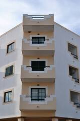 Corner Balconies on Residential Building seen from Below 