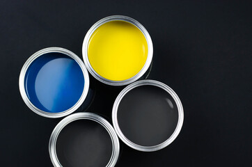 Paint cans in trendy color combinations.