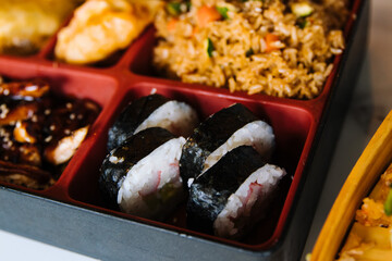 Close up chinese food box with sushi