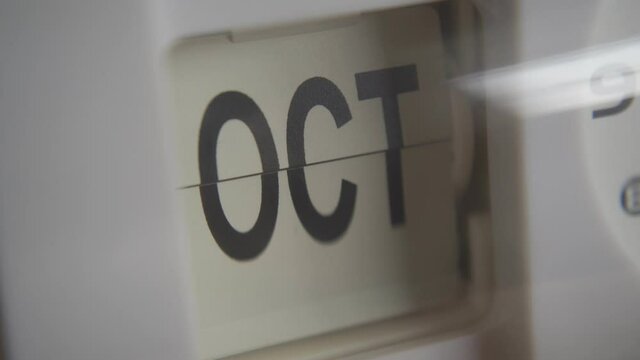 The clock changing the month continuously with zooming in