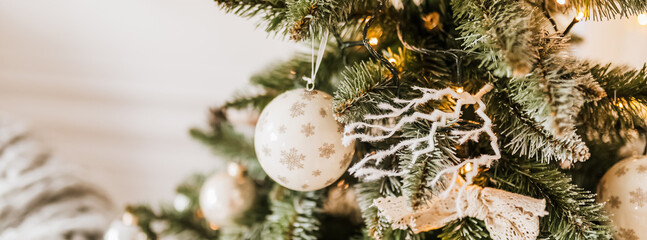 Christmas decorations at home. New year lights, toy, wreath and tree