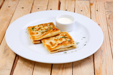 stuffed pancakes with sour cream