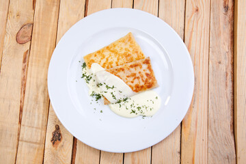 stuffed pancakes with sour cream