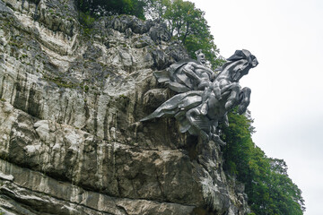 Cloudy view of Monument Wasgergi (George The Victorious) in a rock of North Ossetia Alania, North...
