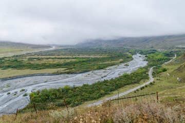 Naklejka premium Cloudy view of ancient Alanian necropolis (the City of the Dead) of Dargavs village in North Osetia Alania, North Caucasus, Russia