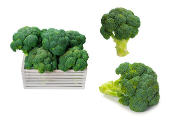 Fresh tasty broccoli in wooden box isolated