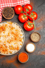 Vertical view of preparation of tasty dinner foods and one ready meal