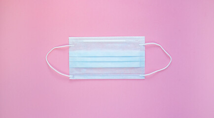 ginger root on a medical mask . foods that are good for health and immunity. virus protection. top view