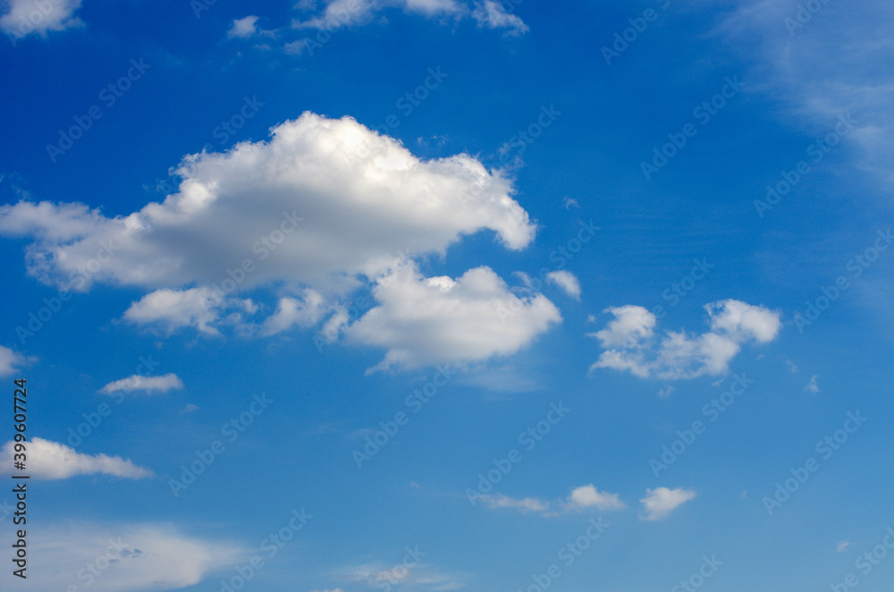 Wall mural white clouds in blue sky