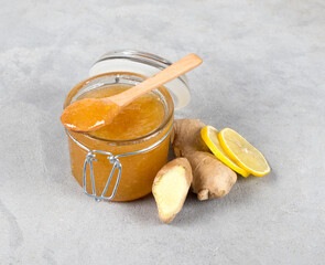 lemon ginger marmalade in a jar on a light gray background