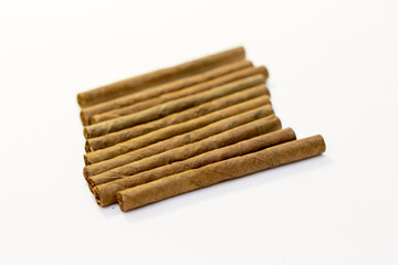 Natural cigarillo isolated on the white background