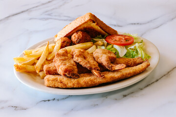 Mexican food fried fish with fries