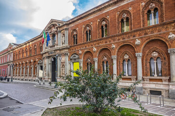 Fototapeta premium The exterior of the University of Milan. University of Milan is based in famous La Ca Granda - huge Ospedale Maggiore complex. Milan, Lombardy, Italy.
