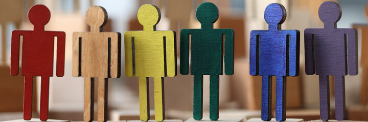 Wooden little men in lgbt colors. Sex minorities and their lifestyle concept