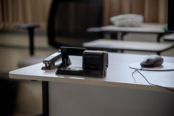 Ink stamp on office table on blurred and selective background