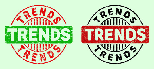 TRENDS bicolor round rubber imitations with unclean style. Flat vector scratched seal stamps with TRENDS text inside circle, in red, black, green colors. Round bicolor seal stamps.