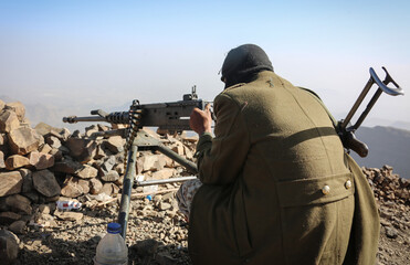 A Yemeni soldier fights in the ranks of the legitimate army against the Houthi militia in the Taiz...