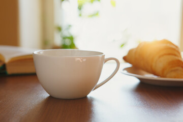 drinking coffee and reading books in the morning, breakfast