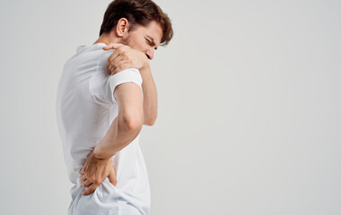 man experiencing pain in the cervical vertebrae osteochondrosis medicine