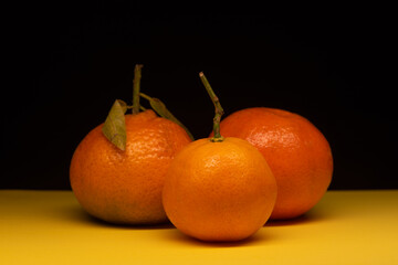 tangerines on black background