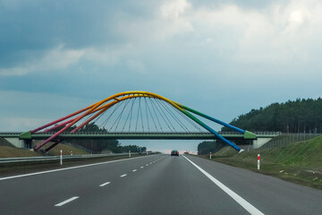 cloudy sky and rainbow viaduct, A2 highway
