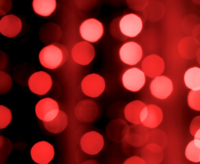 abstract blurred of red bokeh background for design.
