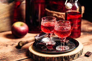 Homemade red currant nalivka and chocolate