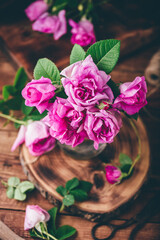 Bouquet of pink garden roses in jar
