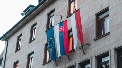 European and Slovak flags on a building in Bratislava