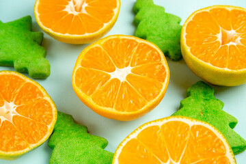 front view fresh tangerine slices on light-blue background photo fruit citrus orange color