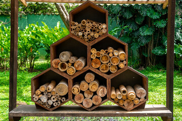 Different Sizes of Stacked Logs Showing the Bark