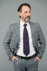 mature businessman with beard and moustache wear stylish formal suit, business fashion