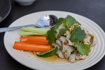 Thai garlic lime pork called Moo Manao