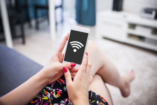 Home Wifi network. Wireless internet connection. Tablet mobile spot. Online symbol background. Wi-fi icon. Modern computer technology. Mobile device network signal. Girl holding mobile phone.
