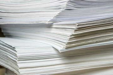 bundles bales of paper documents. stacks packs pile on the desk in the office