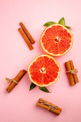 top view tasty grapefruits fruit slices with cinnamon on pink background diet mellow fruit juice color citrus fresh