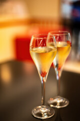 Tasting of cold brut Champagne sparkling wine  in underground cellars of wine house in Reims, Champagne, France