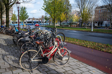 Fototapeta na wymiar City life and transportation in Netherlands, bicycle parking in old part of Amsterdan
