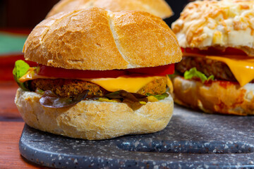 Healthy vegan or vegetarian fast food, fresh made plant based burgers with vegetables