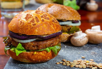 Healthy vegan or vegetarian fast food, fresh made plant based burgers with vegetables