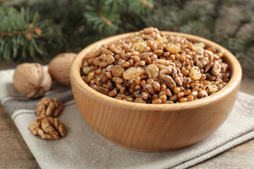 Traditional Christmas slavic dish kutia served on wooden table, closeup