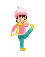 Cute little girl in winter clothes playing a snowball