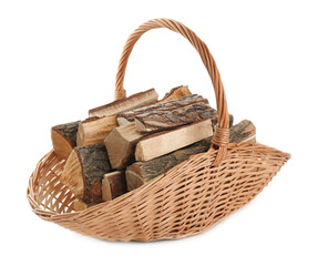 Wicker basket with firewood on white background