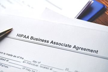 Legal document HIPAA Business Associate Agreement on paper close up