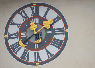Clock detail on the famous Clock Tower on Schlossberg hill, in Graz, Styria region, Austria