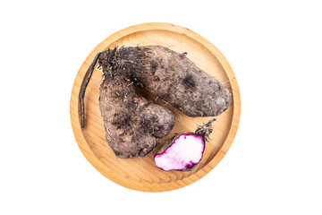 Fresh purple sweet potato on white background